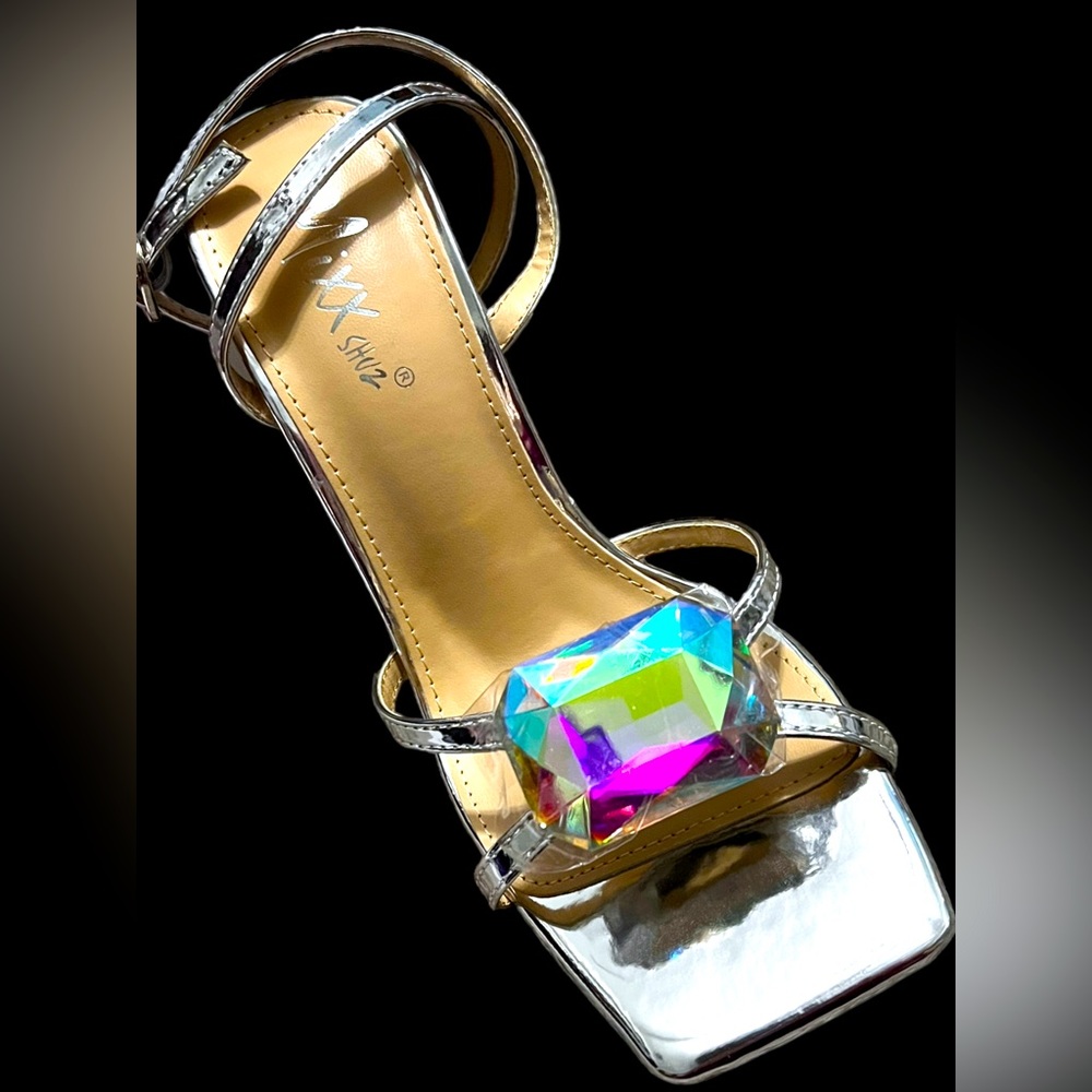 Silver heels with giant gem